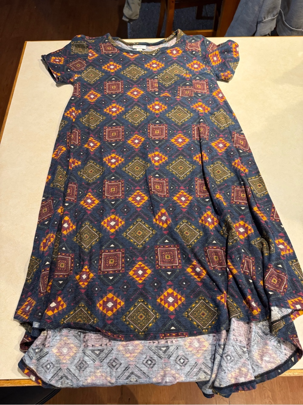 LuLaRoe Navy Dress with Orange and Mustard Geometric Print